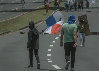 Panama City, Panama; March 18, 2021: Students take the front street of the Universidad de Panama in a protest against government corruption