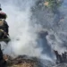 Personal de Conred en un incendio forestal en  San Martín Jilotepéque, Chimaltenango, Guatemala.